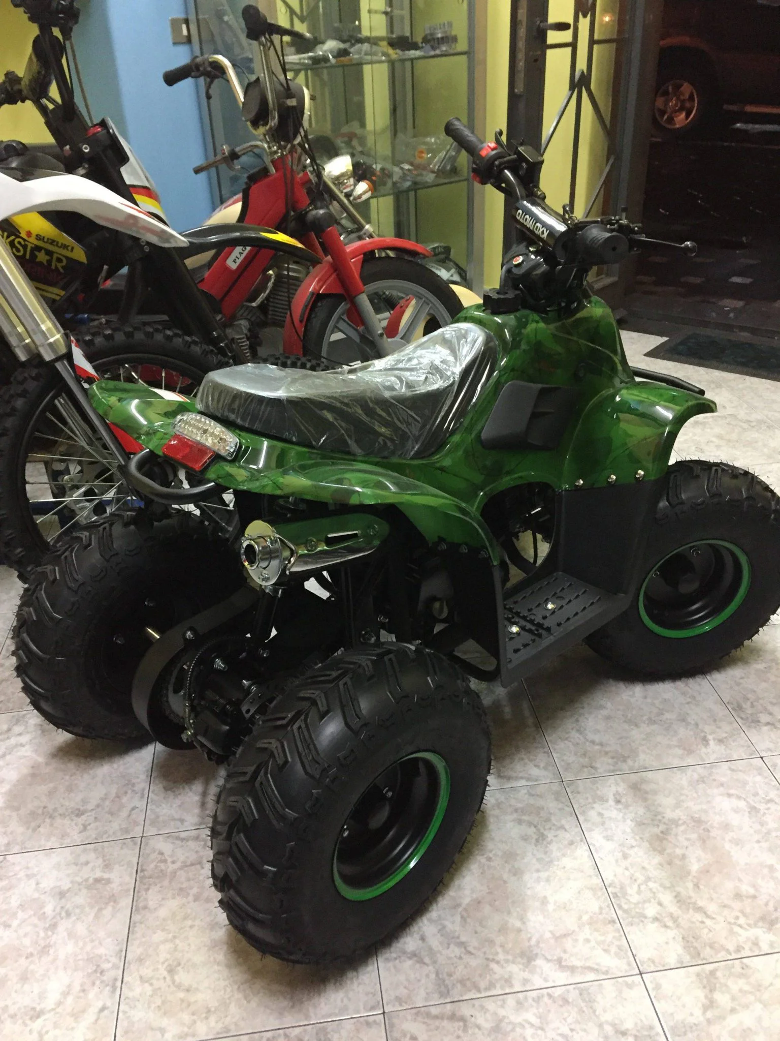 Quad Bambu’ 125cc 4T ruota 7″ avviamento elettrico, luci, telecomando, retromarcia, foto 5