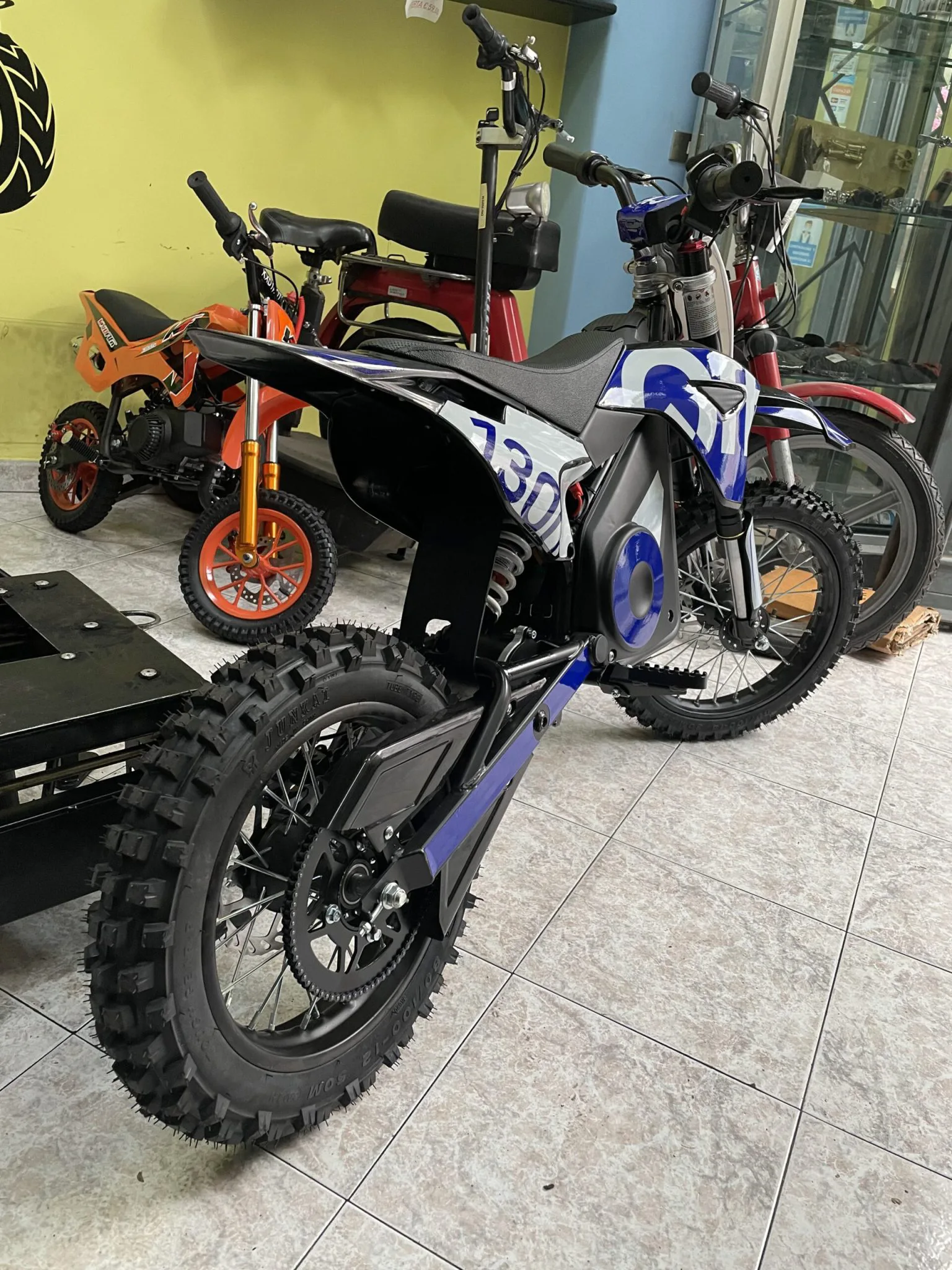 Pit bike elettrica OFFMX 1300W litio ruote 14″12″, foto 6