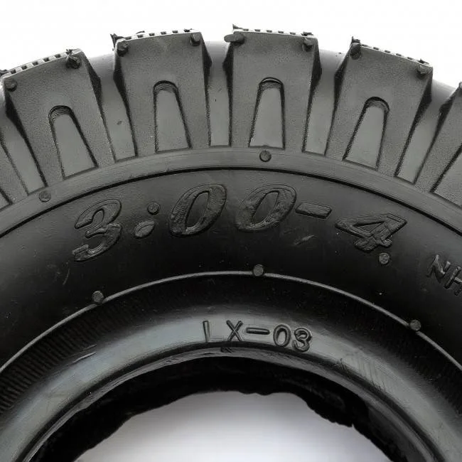 Treno completo di 4 gomme 3.00-4 tassellata, foto 3