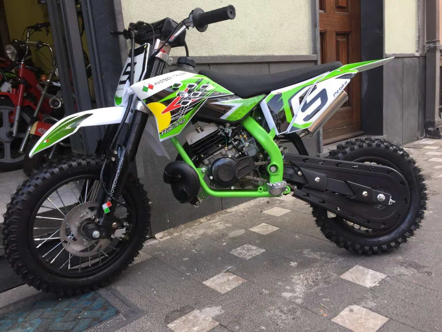 Mini cross 50cc 2T ruota 10″ 12″avviamento a pedale, carburatore 18