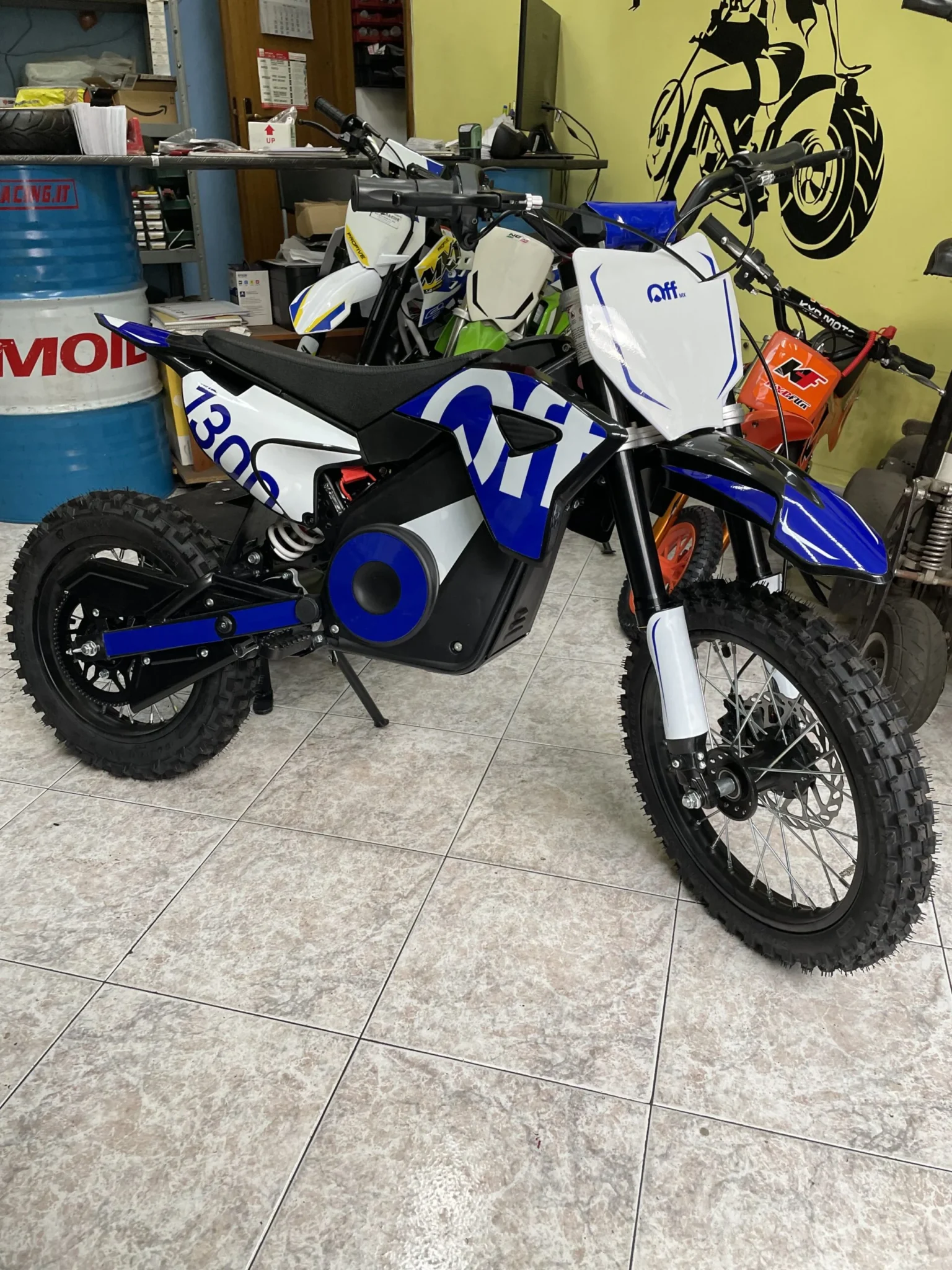 Pit bike elettrica OFFMX 1300W litio ruote 14″12″